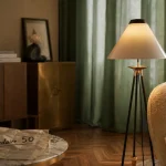 Lampadaire vintage annee 50 tripode laiton liseuse en salon lumineux